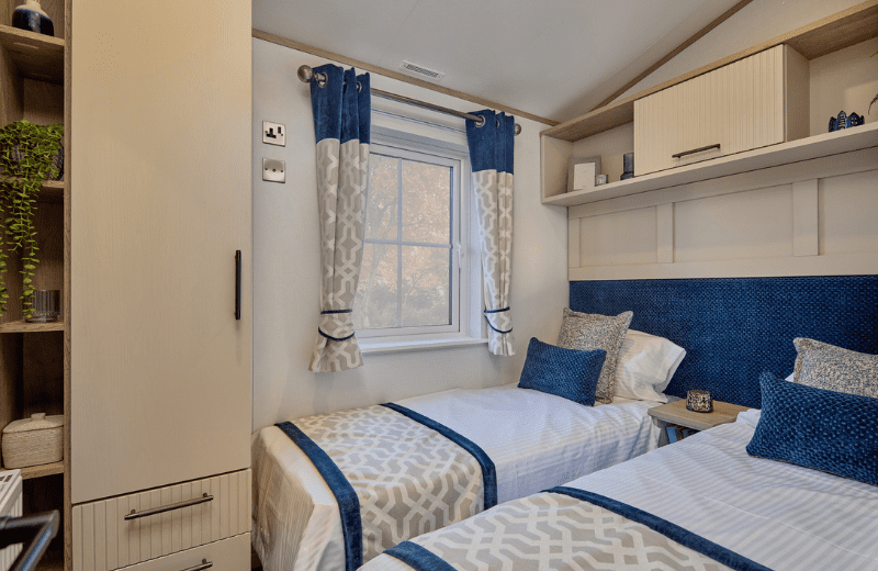 High-quality, contemporary touches in the new Vogue include fluted cabinets in both the master bedroom and twin bedroom, as well as wireless chargers inside the bedside drawers. 