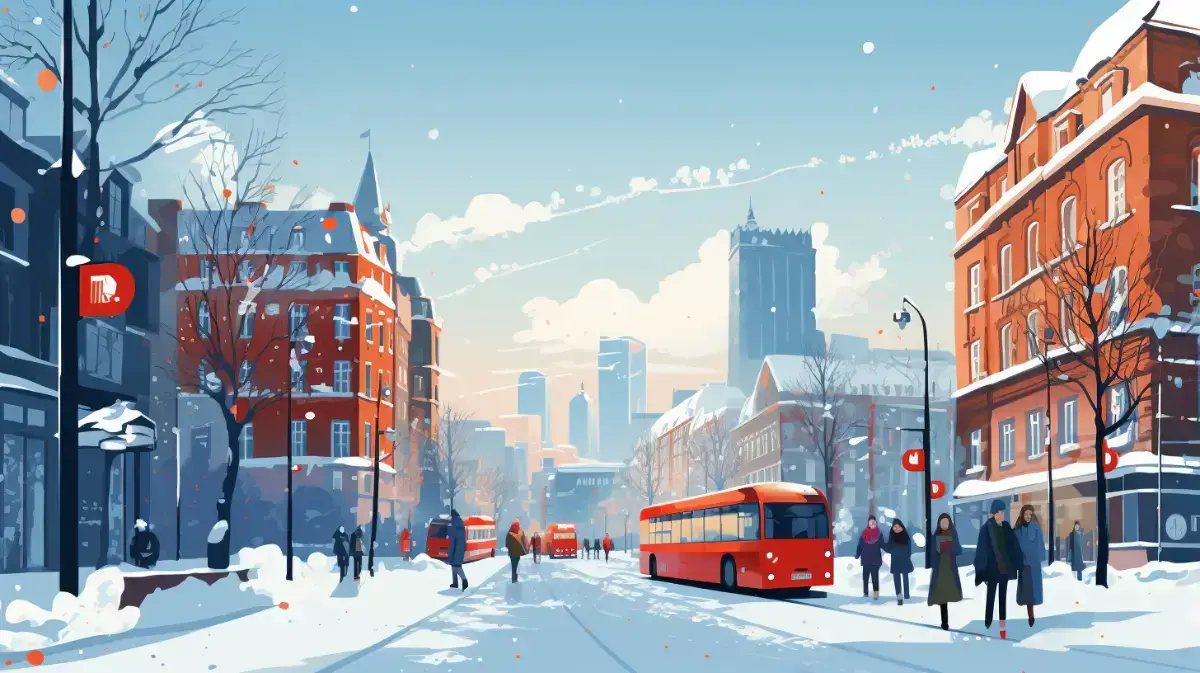 Wintery city with a covering of snow and red buses